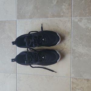 Men's size 12US, 11.5 UK, black court low/mid top sneaker